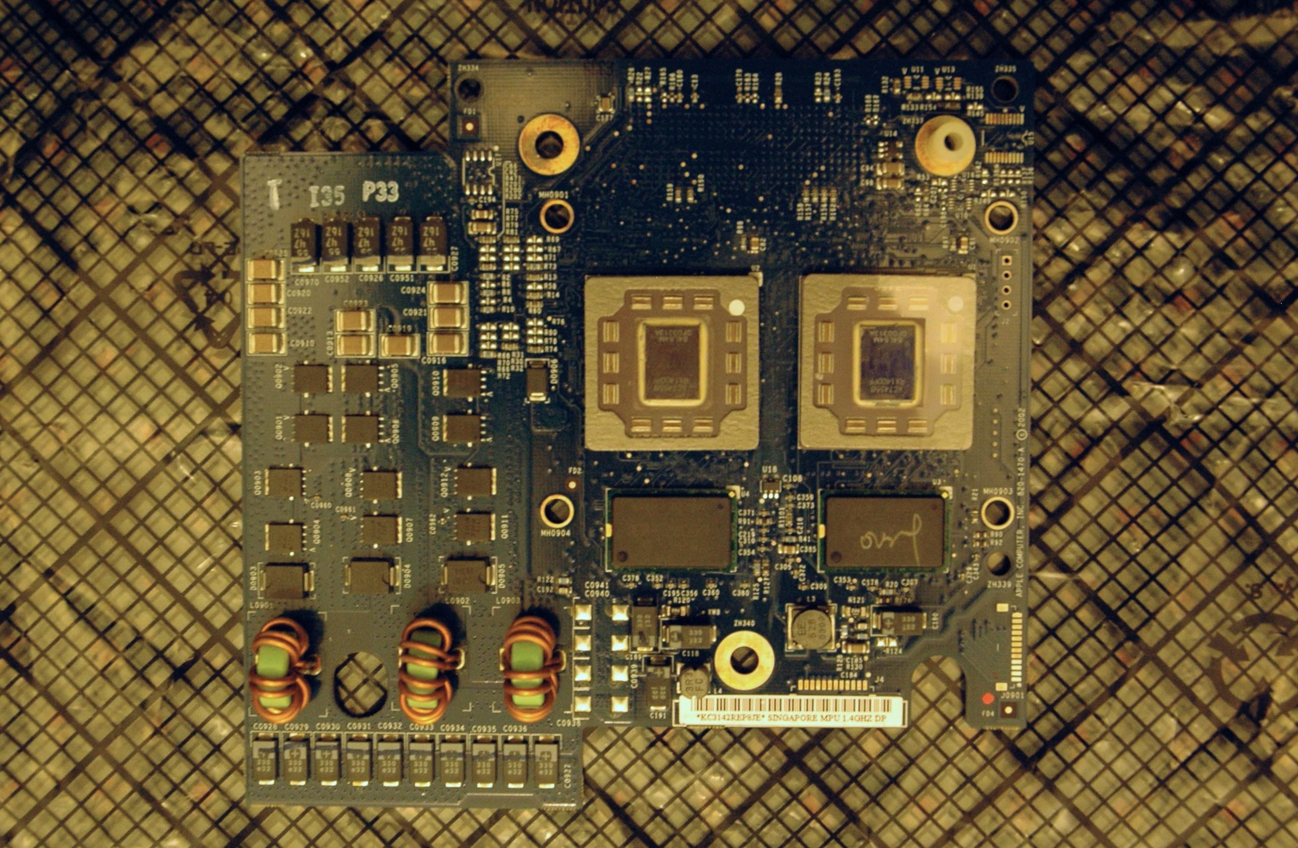 Old photograph of my PowerMac G4 dual CPU board without its heatsink, carrying two Motorola PowerPC 7455 processors.